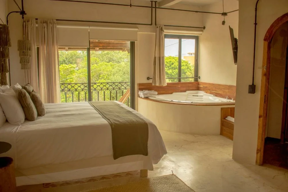 Habitación con jacuzzi en hotel caribbean-paradise-resorts-spa-sa-de-cv en Playa del Carmen, Quintana Roo