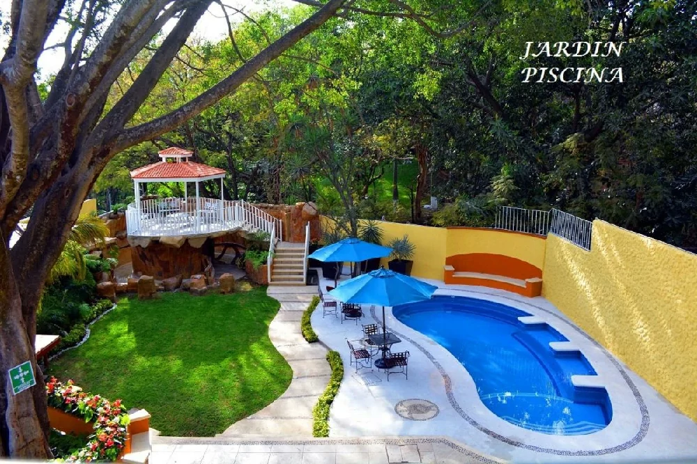 Habitación con jacuzzi en hotel finca-los-cocos-cuernavaca en Cuernavaca, Morelos