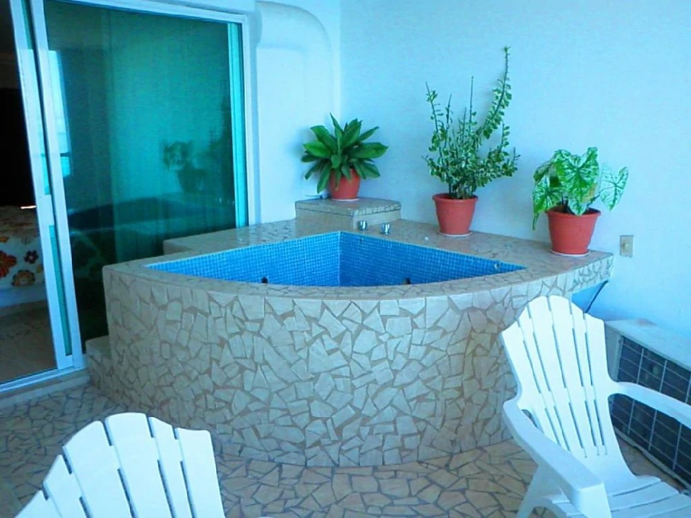 Habitación con jacuzzi en hotel hotelito-escondido en Manzanillo, Colima